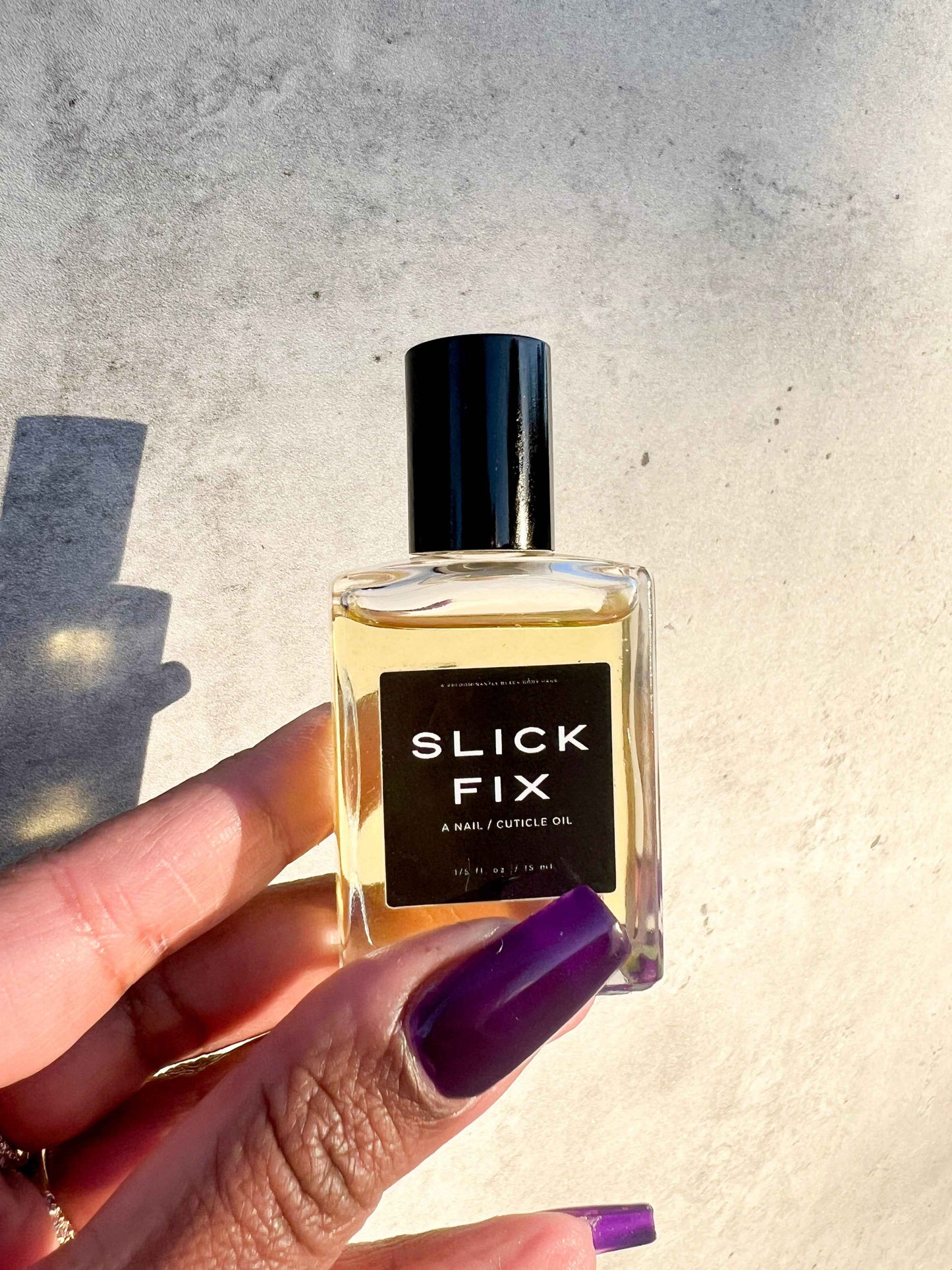 SLICK FIX, A NAIL / CUTICLE OIL