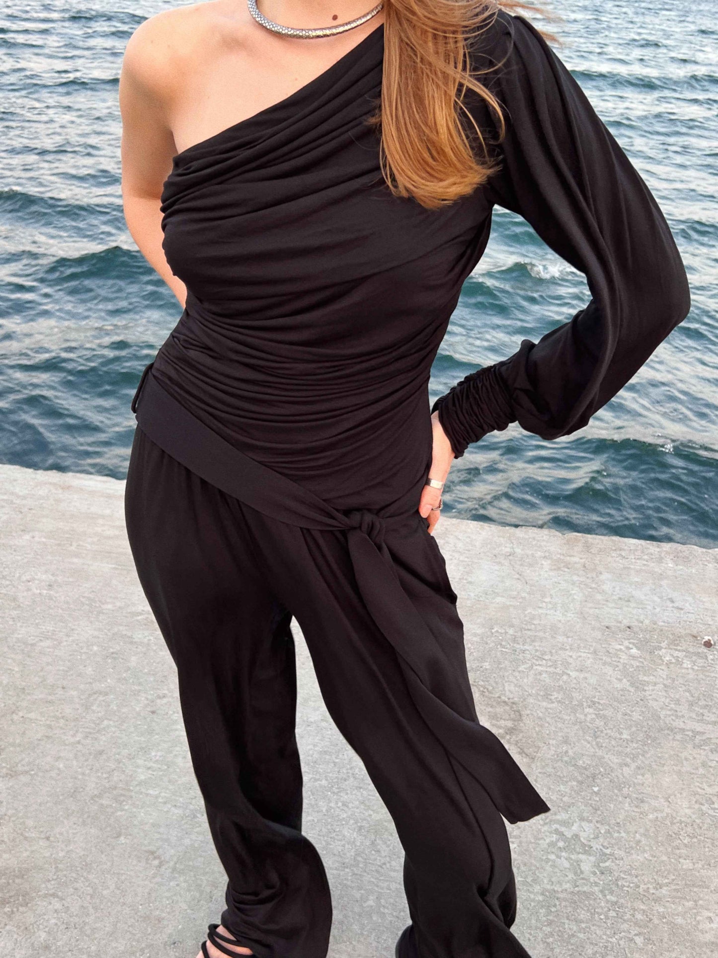 Black Knit 2-Piece Set With An Asymmetrical One-Sleeve Blouse And Palazzo Pants